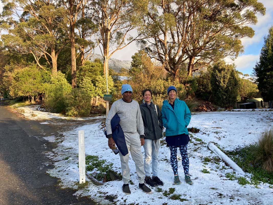 A chance to touch some snow before heading to the airport, Shaun Evans with project partner Jackie Gould (CDU) and Laura Boren (PWC). 