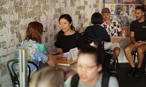Employers and student chatting